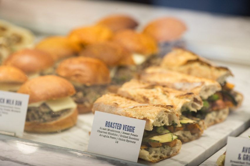 Customers can walk in and nab a pastry, sandwich, slice of pizza or a full hot meal from the counter and take it home or sit down in a front lounge area. (NICK KOZAK) 